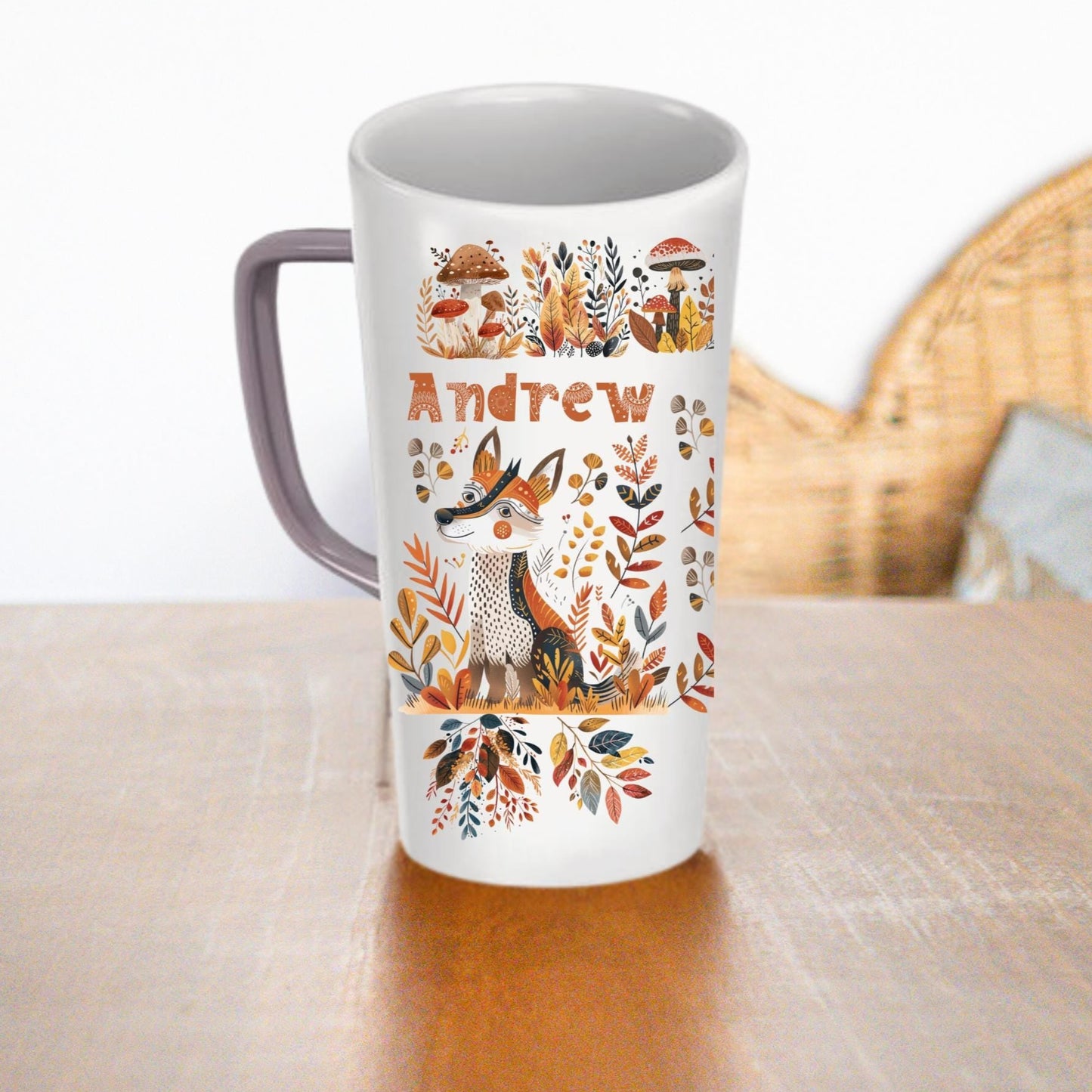 A ceramic latte mug of 16 and 12oz with a fox and mushrooms in warm colors and custom name