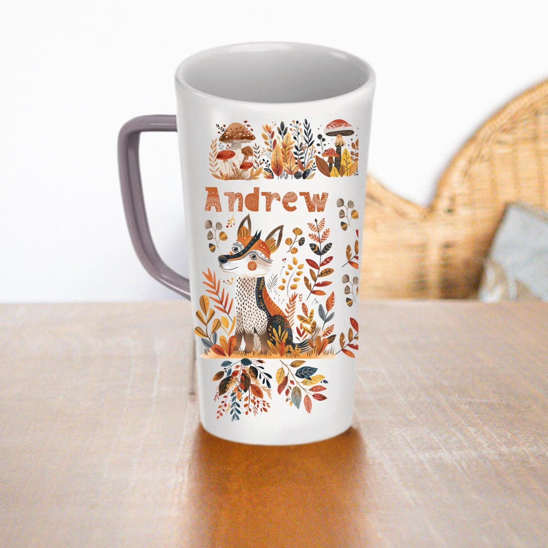 A ceramic latte mug of 16 and 12oz with a fox and mushrooms in warm colors and custom name