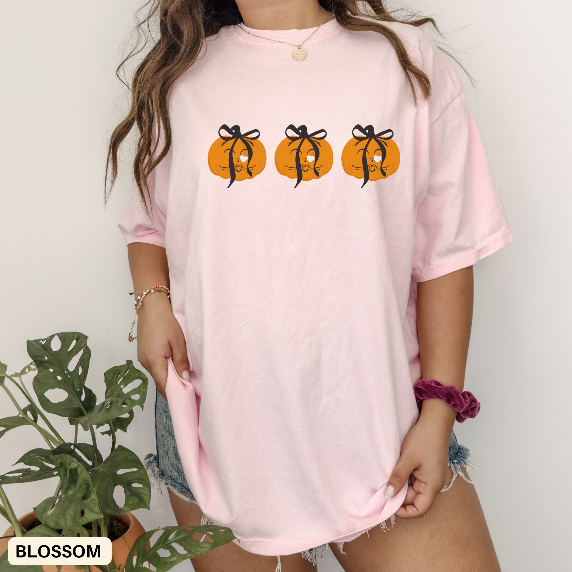 pink t-shirt with pumpkin graphics